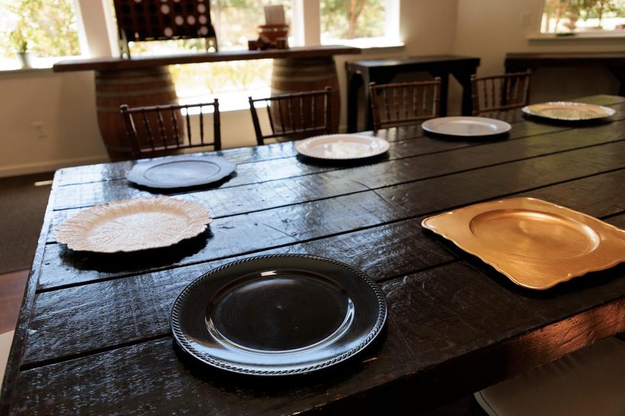 A layered place setting with charger plate.