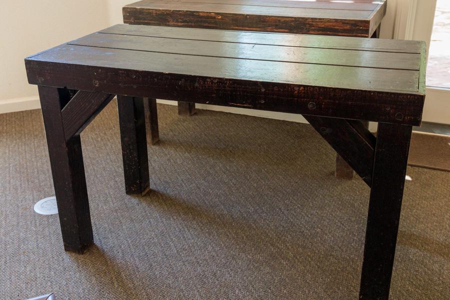 A high-top cocktail table with linen.