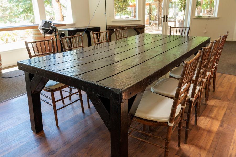 A farm-style banquet table that seats about eight.