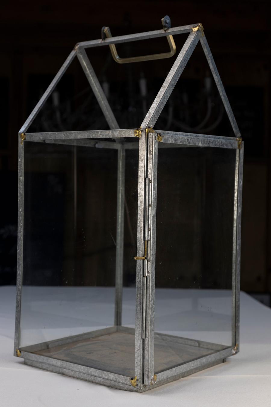 Lanterns from the assorted house collection for aisle and table styling.