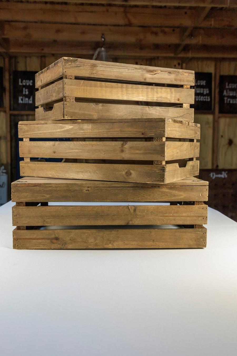 Rustic wooden display crates in assorted sizes.